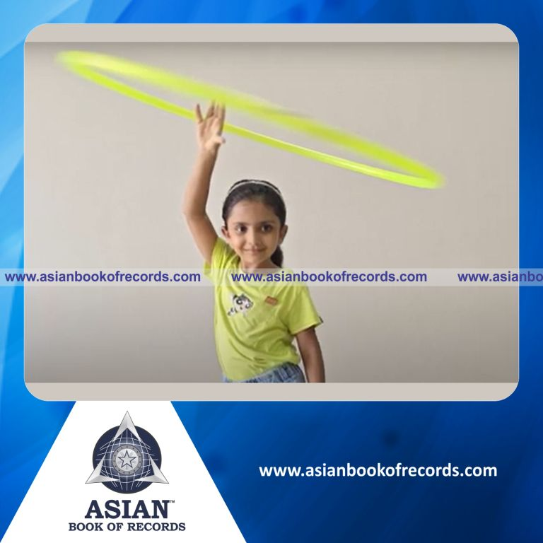 Highest Number of Hula Hoop Passes while Rotating From One Folded Elbow to another Elbow in One Minute by a Pre-Schooler